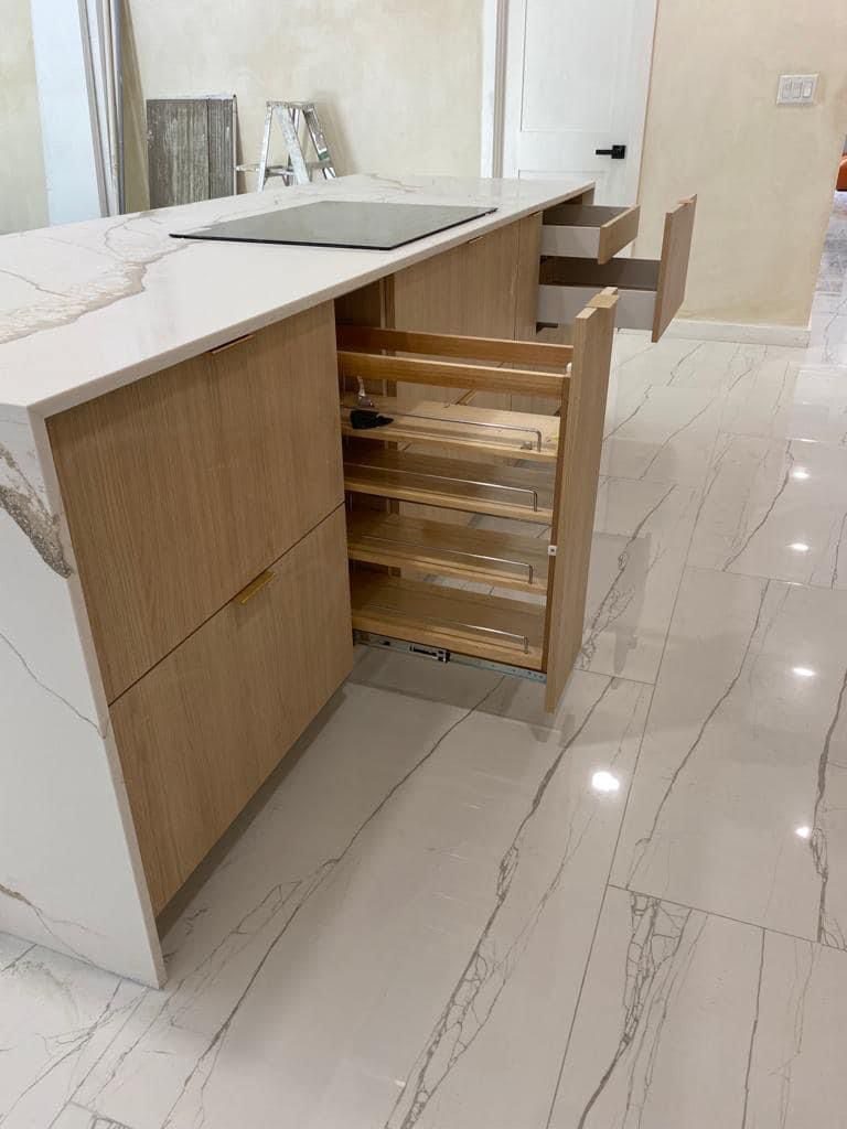 Custom wood cabinetry with pull-out storage