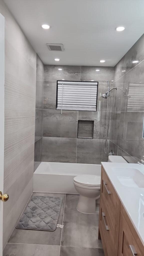 Bathroom with glass-enclosed walk-in shower