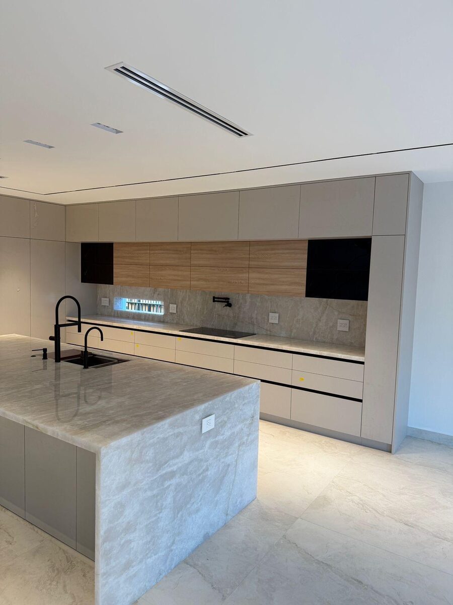 Marble bathroom with glass shower and soaking tub